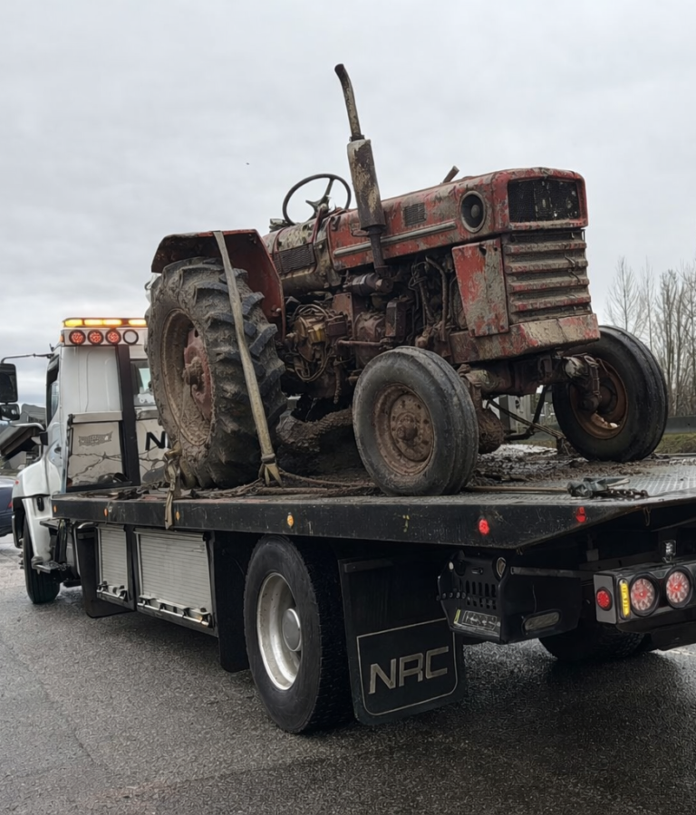 non working junk tractor being removed
